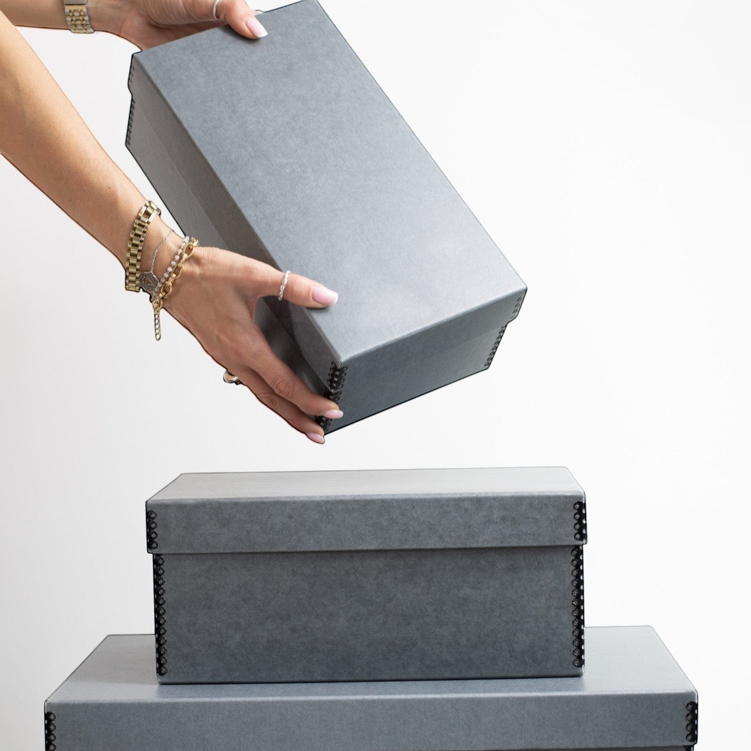 Kept Store acid-free shoe storage box in grey with white tissue paper for protecting delicate high heels.