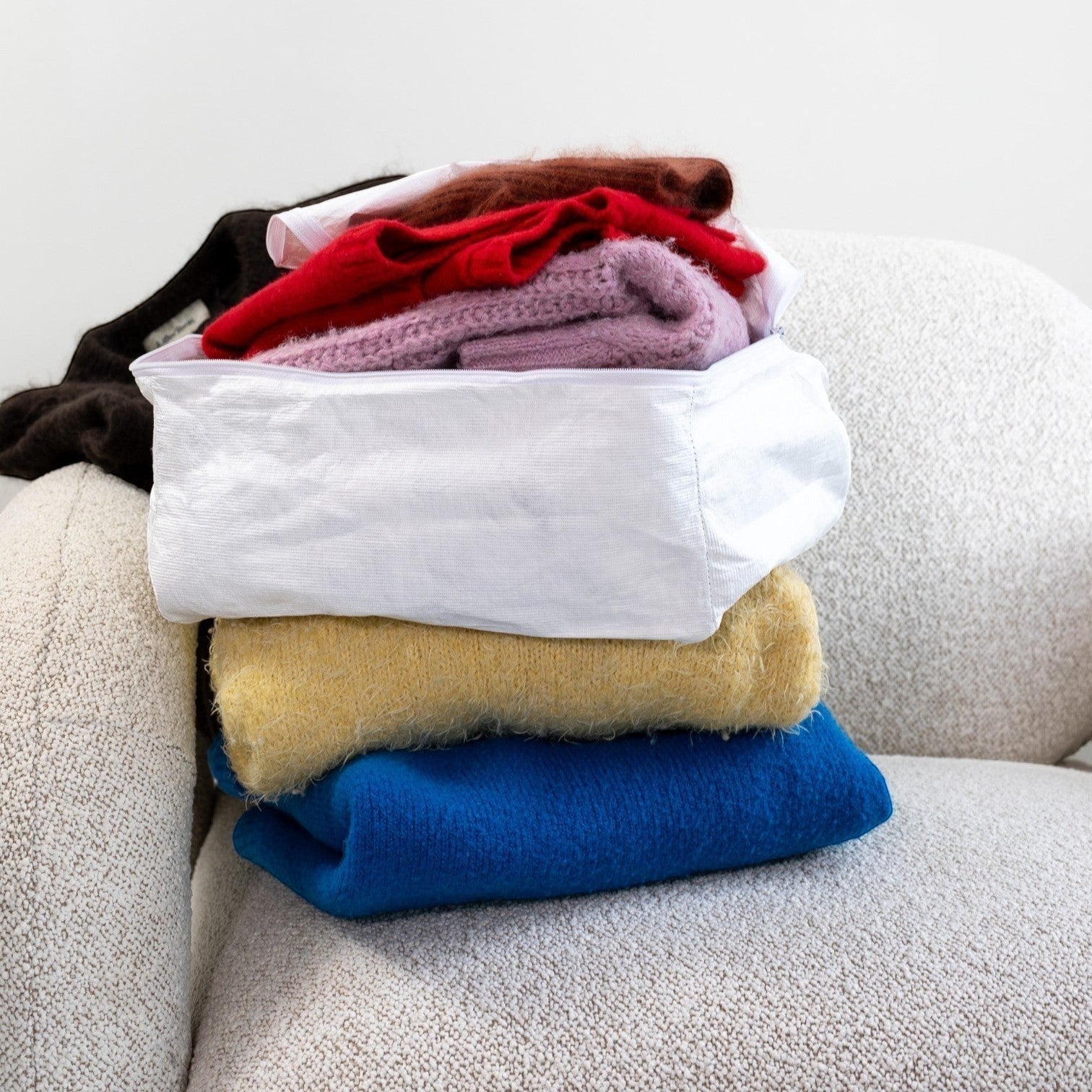 Kept Store small knitwear storage bag in white, breathable conservation-grade protection for fine knits.