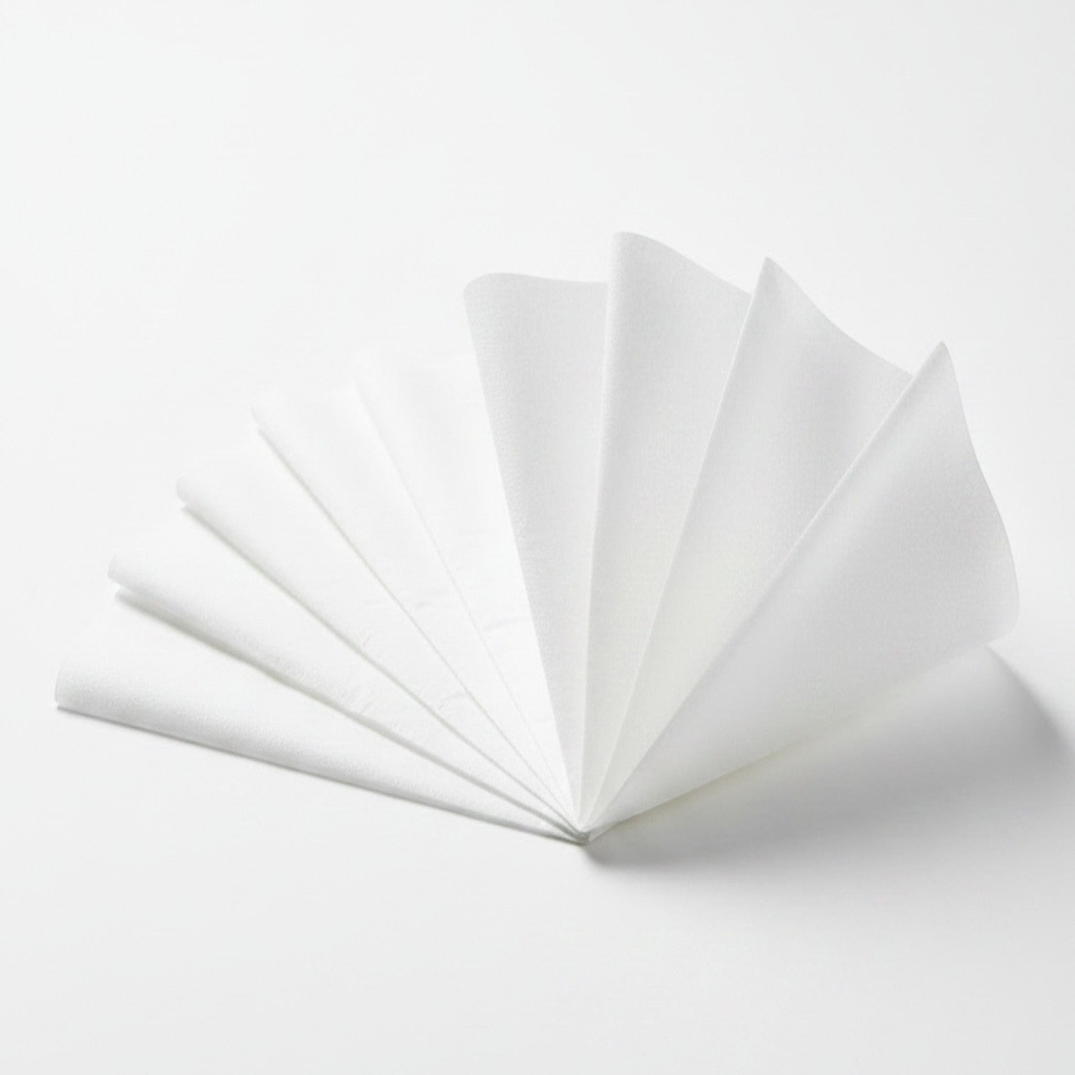 Sheets of Kept Store acid-free unbuffered white tissue paper for conservation-grade storage.