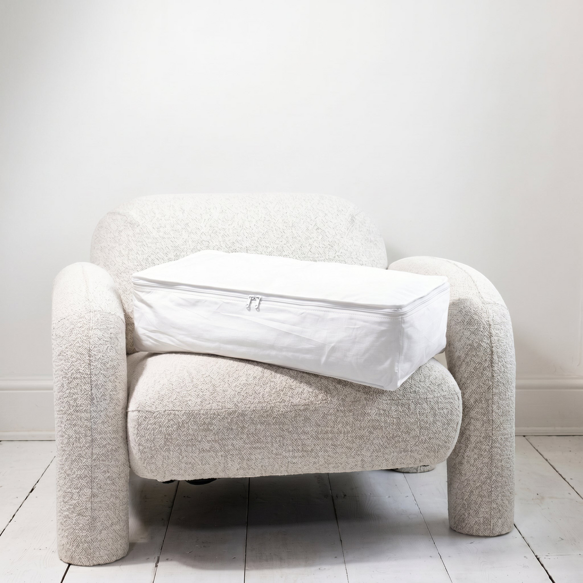 Kept Store large knitwear storage bag in white with its full three-sided zip closed.