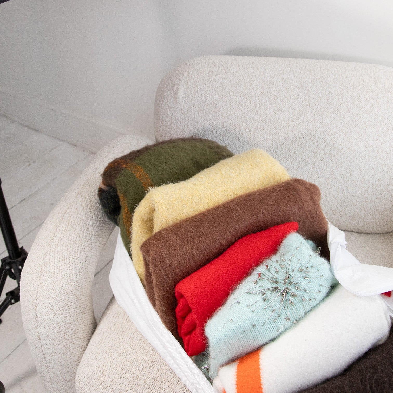Kept Store large breathable knitwear storage bag protecting folded jumpers from moths and dust.