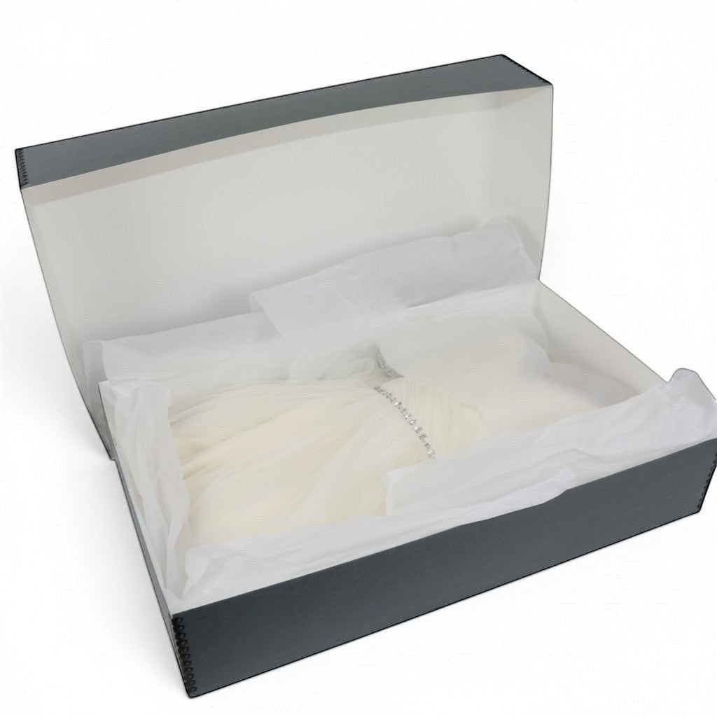 Kept Store acid-free wedding dress storage box with white tissue paper for delicate garment preservation.